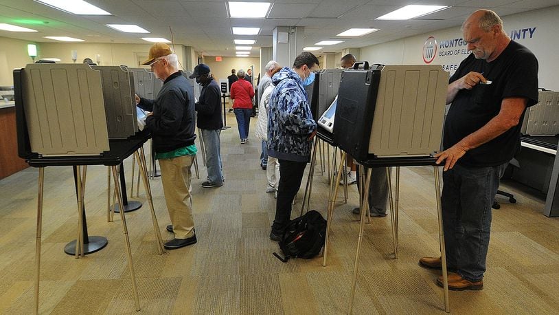 Voters at the Montgomery County Board of Elections Wednesday Oct. 12, 2022. Early voting started Wednesday in Ohio. Election officials expect a large turnout of early voters this year. MARSHALL GORBY\STAFF