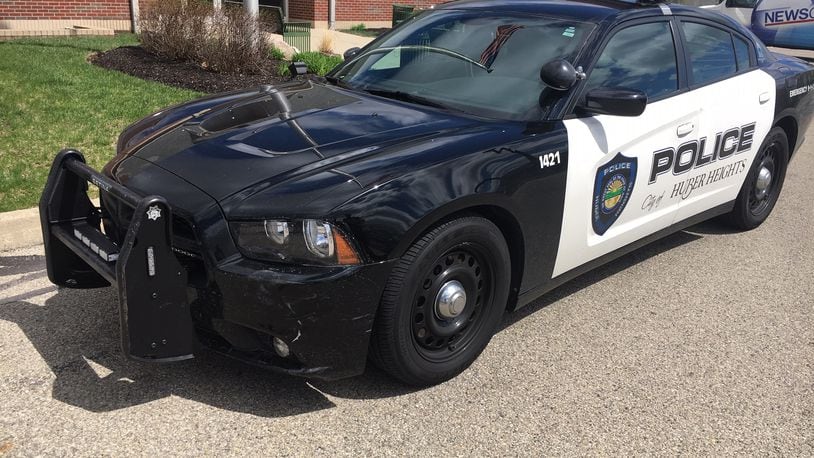 A Huber Heights Police cruiser suffered minor damage after reportedly using a PIT maneuver to stop the chase along I-70 in Clark County Sunday. MIKE CAMPBELL/STAFF