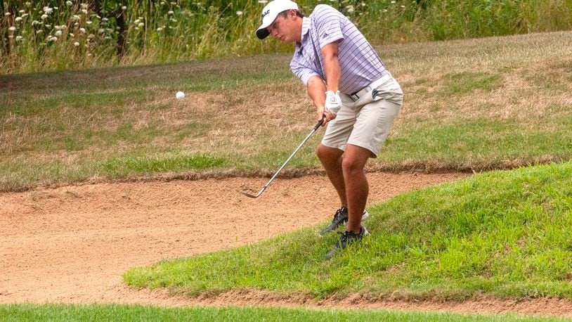 Caleb Westfall chips from behind the No. 8 green Saturday, July 18 on the Reid Park North Course. He got close enough to save par on the par 3. Westfall won his second straight City Amateur title.