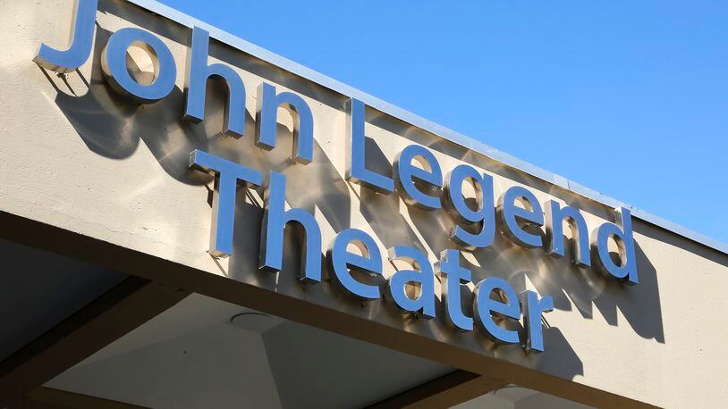 The sign on the outside of the new John Legend Theater Sunday. Bill Lackey/Staff