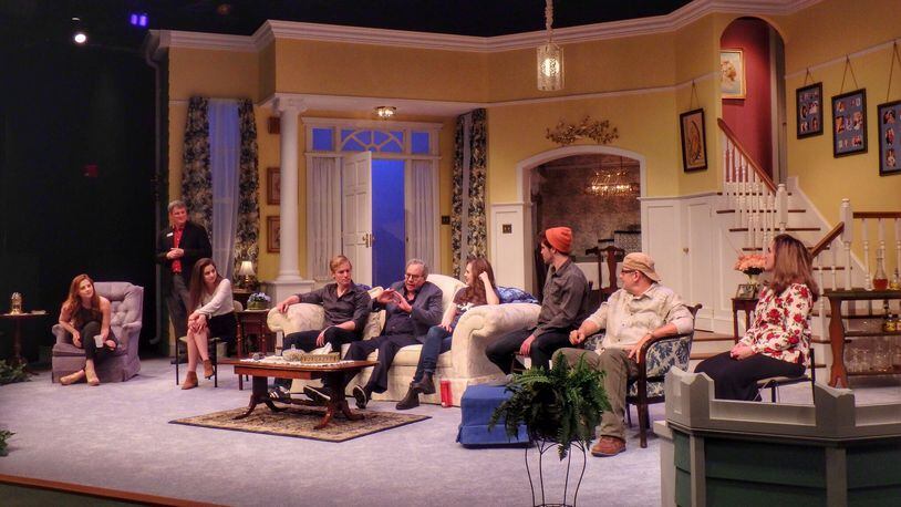 Surrounded by the cast of his play, 'One Slight Hitch," Lewis Black (center on couch) answers questions from The Loft Theatre audience on Wednesday, April 20.