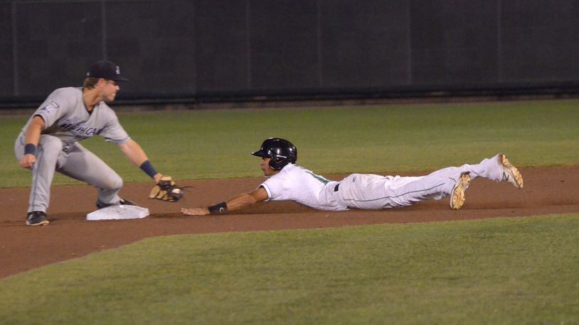 Jose Siri of the Dayton Dragons steals second in the eighth inning against the West Michigan Whitecaps on Thursday night at Fifth Third Field. BRIAN SWARTZ / CONTRIBUTED