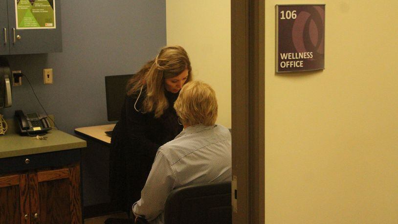 Nurse Wanda Atkins taking Leah McMaken blood pressure at United Senior Services in Springfield. DAN PASCIAK/STAFF