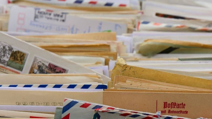 A former elementary school teacher stays in contact with former students by sending them letters and cards for their birthdays.